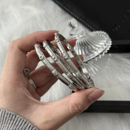 Sterling Silver Rhodium Plated SunStar Zirconia Buccellati Bangle